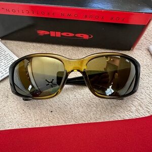 Bolle ‘Habu’ unisex gold & black Frame Sunglasses with gray polarized Lenses